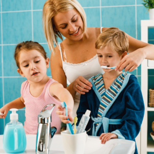 Teaching child how to brush teeth